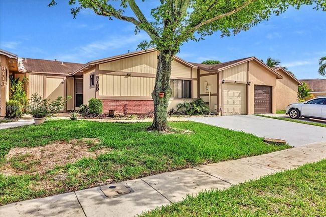 0 - 9780 W Daffodil Ln, Home with 3 bedrooms, 2 bathrooms and null parking in Miramar FL | Image 48