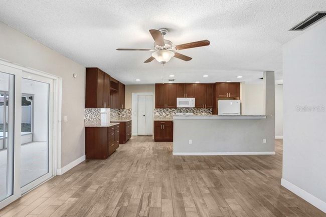 View from living room to the kitchen | Image 10
