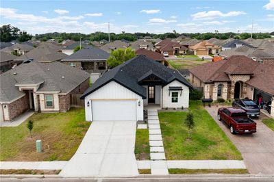 View of front of house with a front yard | Image 2