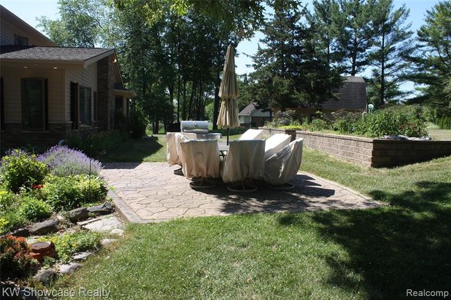 Backyard patio- enjoy summer meals, dining al fresco while you watch the wildlife play in the yard. | Image 63