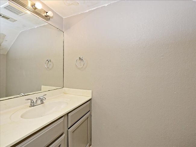 Not actual unit, similar layout. Half bathroom downstairs. | Image 9