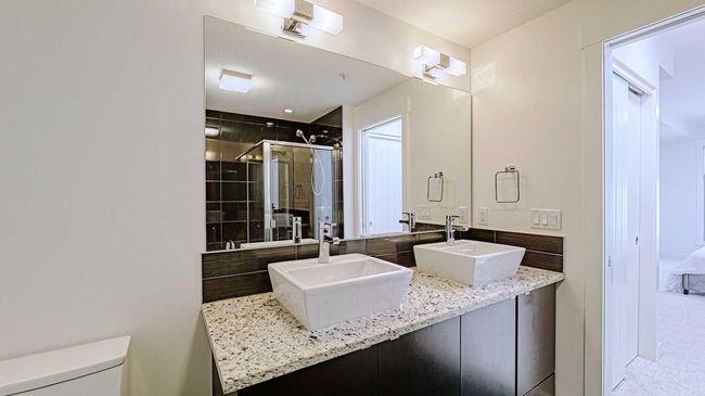 122 - 15 Aspenmont Hts Sw, Condo with 2 bedrooms, 2 bathrooms and 1 parking in Calgary AB | Image 18