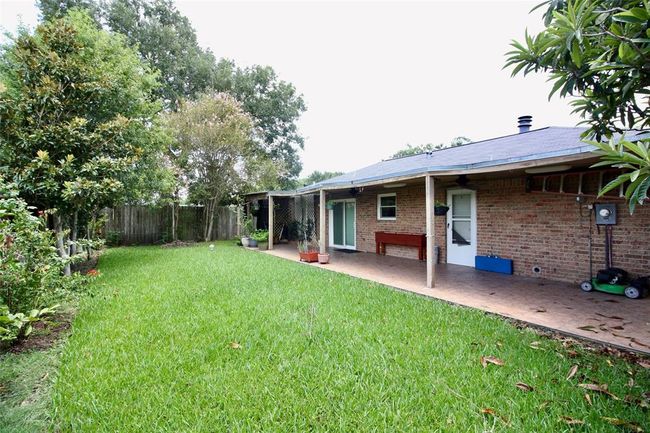 Backyard with large covered patio | Image 5