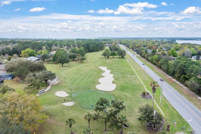7008 Turnberry Cir, House other with 4 bedrooms, 2 bathrooms and 3 parking in Navarre FL | Image 59