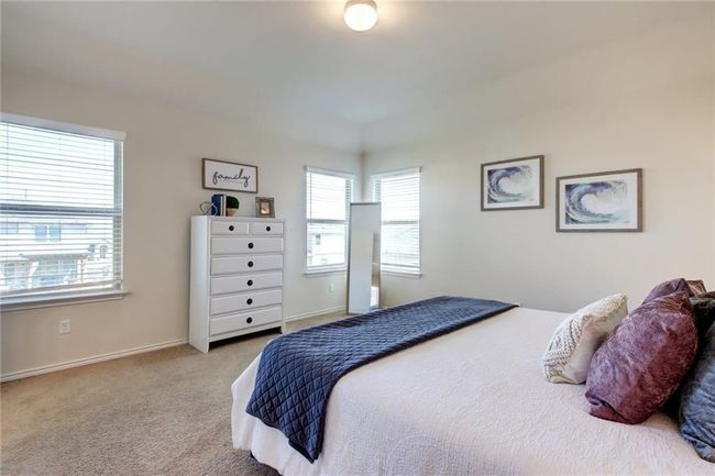 Bedroom featuring carpet and baseboards | Image 18