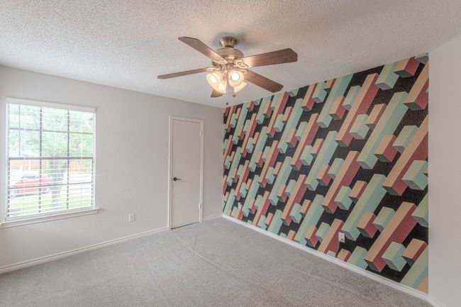 The second of three bedrooms. | Image 21