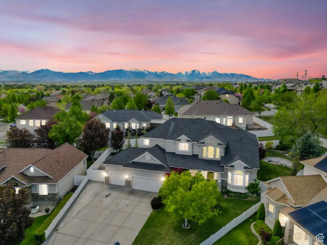 Aerial view at dusk featuring a residential view and a mountain view | Image 7