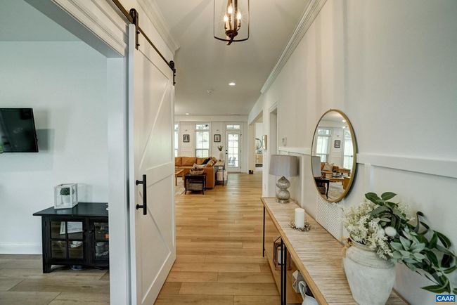 Low maintenance luxury vinyl flooring throughout the main level of the home, and the second floor hallway. | Image 5