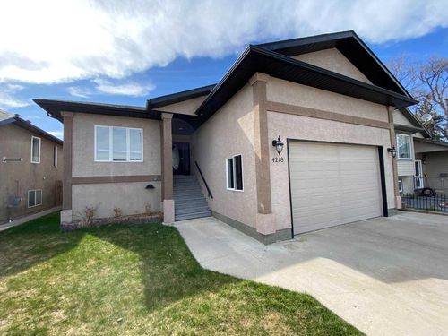 4218 56 Street, Home with 5 bedrooms, 3 bathrooms and 4 parking in Taber AB | Card Image