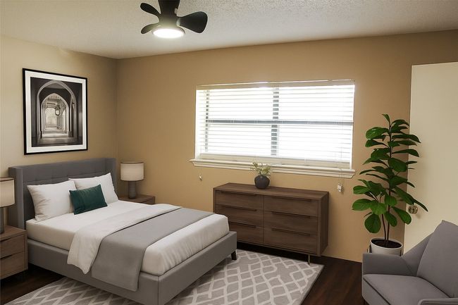 Bedroom with wood finished floors, a textured ceiling, and a ceiling fan | Image 10