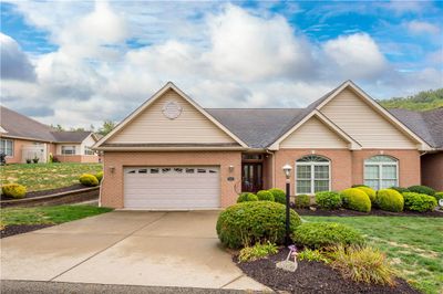 Flat drive leads to 2-car garage | Image 1