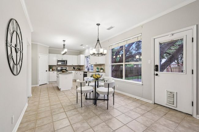 Start your day in this sunlit breakfast nook—where every morning feels bright and welcoming. | Image 15
