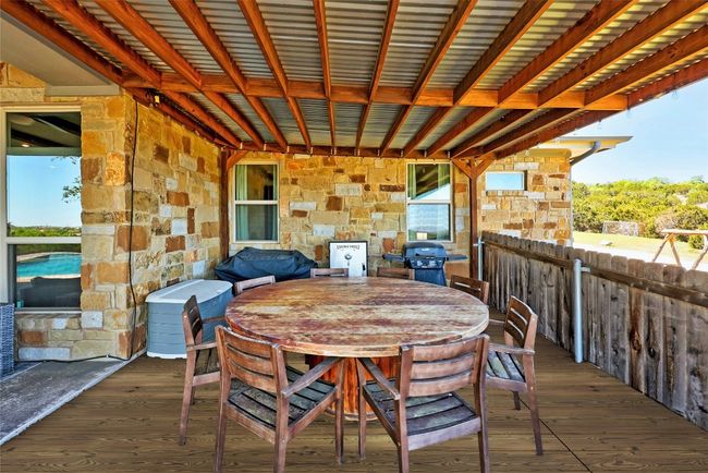 Amazing covered porch with soaring views! What a fantastic place to catch a breeze and a view. | Image 31