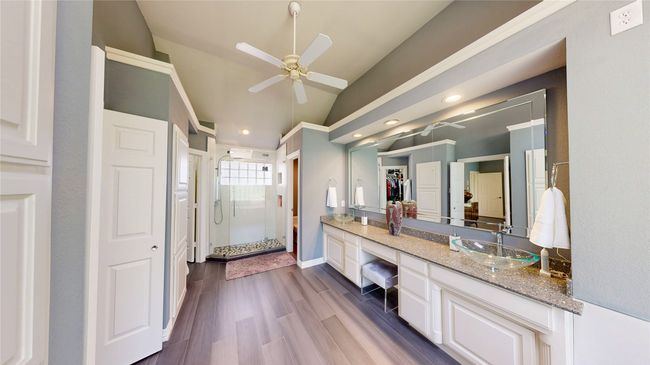 Primary Bath- double vanity, ceiling fan & heated wood-look tile | Image 23