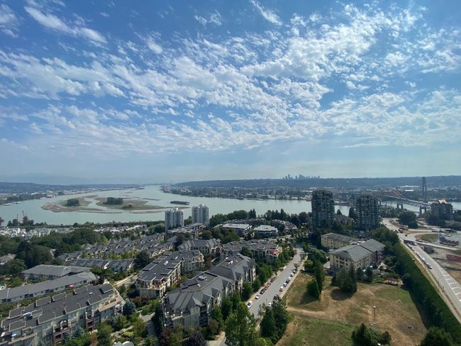 View of urban area with a large body of water | Image 18