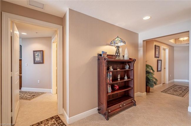 Hallway featuring light tile patterned flooring | Image 13