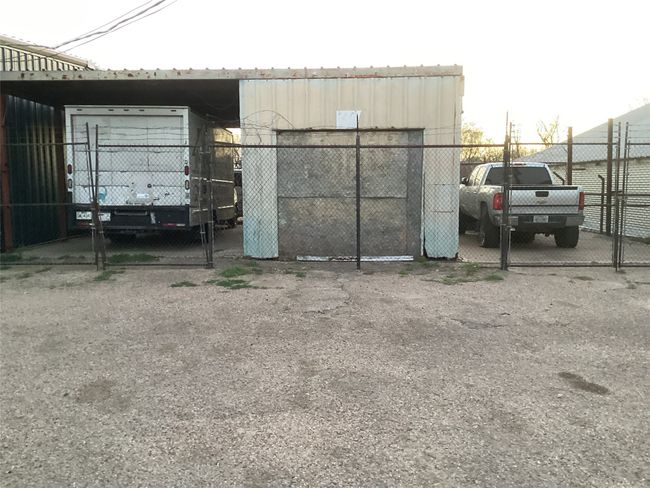 View of outbuilding featuring a gate and fence | Image 9