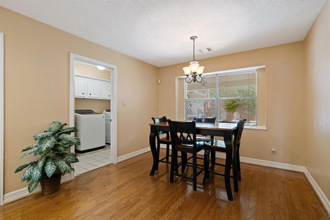 The breakfast nook is just off the kitchen with a great view of the backyard -- the perfect spot for a morning cup of coffee or a casual weeknight dinner with family or friends. | Image 17