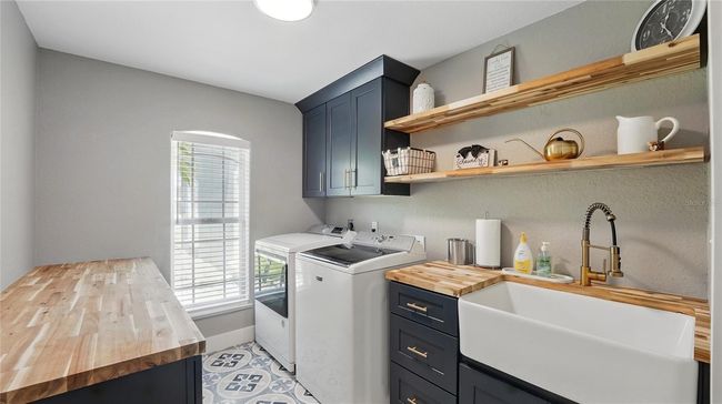 Sleek Laundry room | Image 39