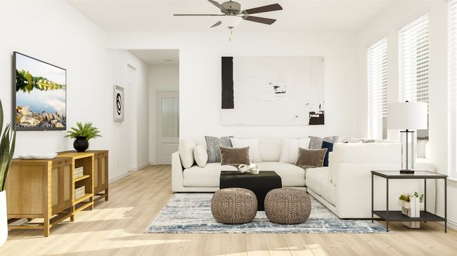 Living area with a ceiling fan and wood finished floors | Image 16
