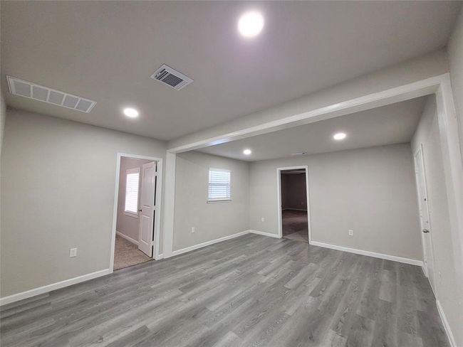 Flex room. Door on the left goes to the home office. Door on the right goes to the primary bedroom. | Image 20