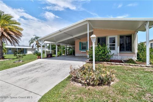 338 Macadamia Dr, Barefoot Bay, FL, 32976-6824 | Card Image