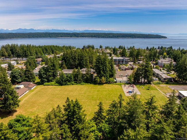 Bird's eye view of a water and mountain view | Image 29