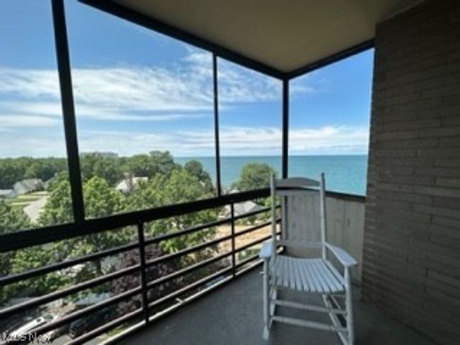 Balcony featuring a water view | Image 27