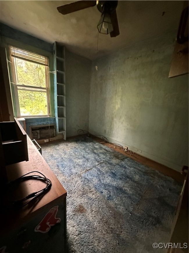 Empty room featuring ceiling fan | Image 18