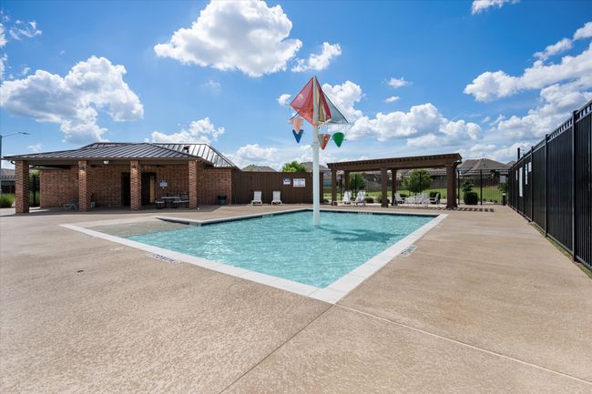 Community pool with a patio | Image 30