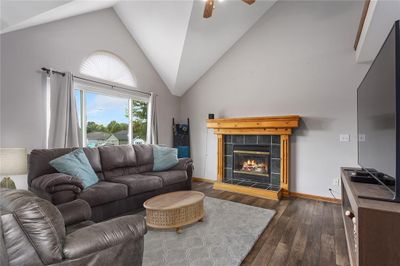 Living room featuring high vaulted ceiling | Image 3