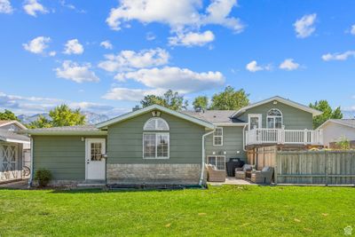 Back of house with a yard and a patio area | Image 3