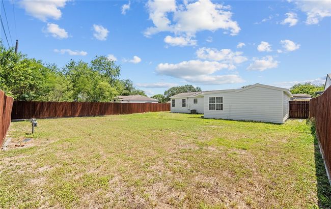 Huge backyard with new wood fence | Image 12