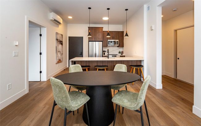 This model has the bedrooms on opposite sides of the kitchen, dining area and living room. Other models have the bedrooms and bathrooms on the same side. | Image 22