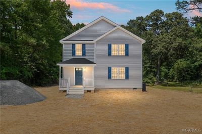 View of property with covered porch | Image 1