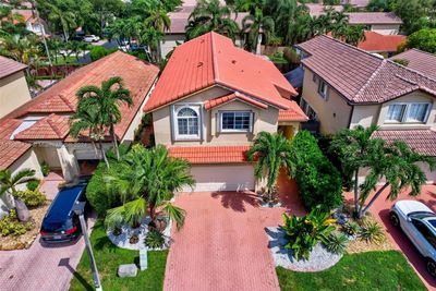 11279 Nw 51st Ter, House other with 5 bedrooms, 3 bathrooms and null parking in Doral FL | Image 1