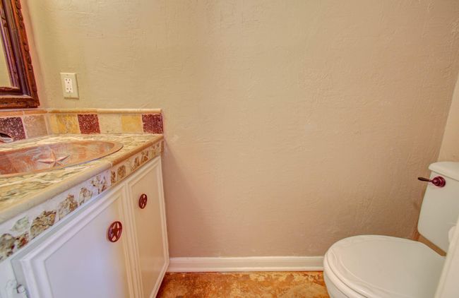 Half bath at the back of home to serve the pool. | Image 31