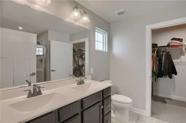 Sleek and modern with large walk in closet. | Image 40