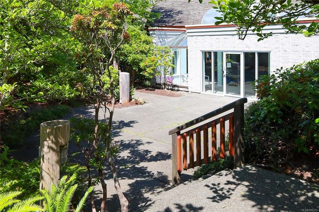 Relaxing patio in front of the swimming pool area | Image 53