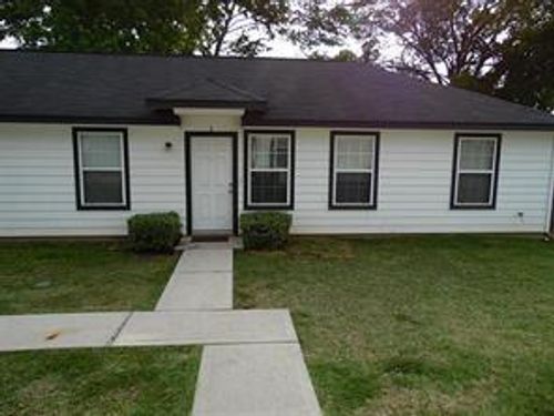 1-204 W Worsham St, Willis, TX, 77378-8817 | Card Image
