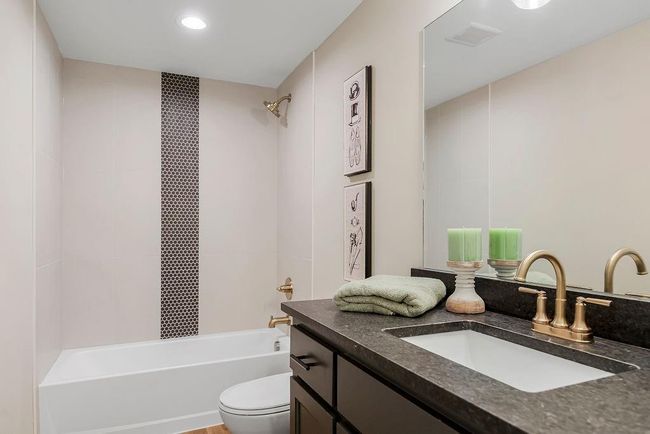 Lower level Rec area with 2 bedrooms and full bath. Photos of previous model home. Not actual listing. Features and sizes may vary. Contact agent for details & showings! | Image 24