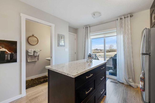 1109 - 2400 Ravenswood View Se, Home with 2 bedrooms, 1 bathrooms and 1 parking in Airdrie AB | Image 15