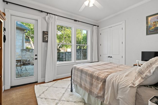 Bedroom with access to exterior | Image 25