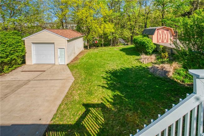 View of back yard from deck. | Image 26
