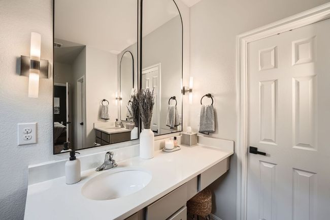 Ensuite bathroom featuring vanity and ensuite bath | Image 17
