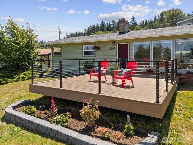 New Timbertech deck offering the perfect spot to relax and enjoy the scenery. | Image 7
