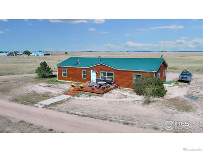 49298 County Road 31, House other with 4 bedrooms, 2 bathrooms and null parking in Nunn CO | Image 2