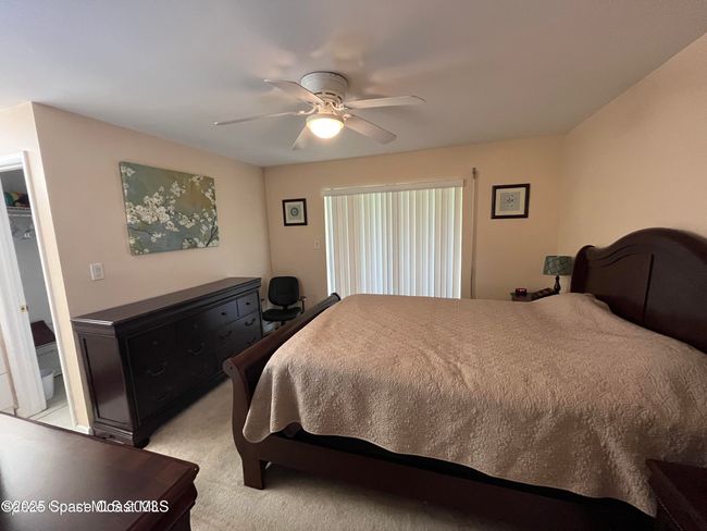 Bedroom with Sliders to Screened Balcony | Image 9