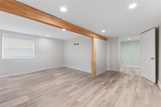 Finished basement with light wood-style floors and recessed lighting | Image 22