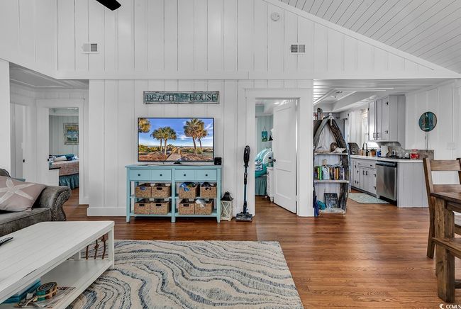 Living room with lofted ceiling and dark hardwood / wood-style floors | Image 8